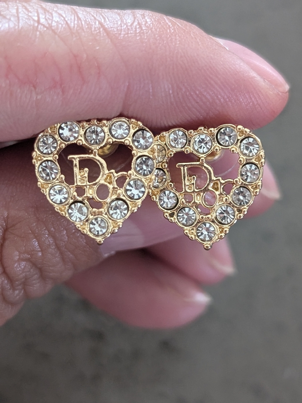 Gold-Tone Crystal Heart Stud Earrings with Decorative 'D' Motif